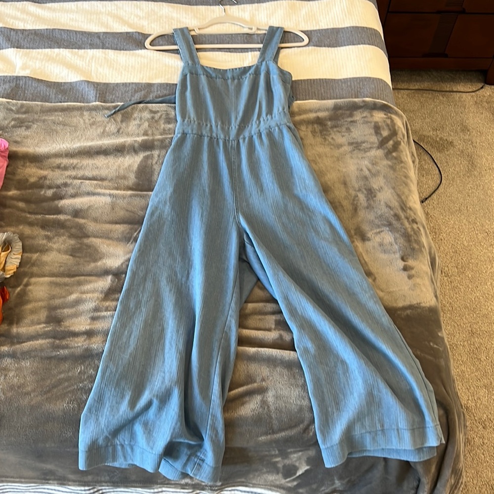Jean jumpsuit. Worn but great condition. Backless